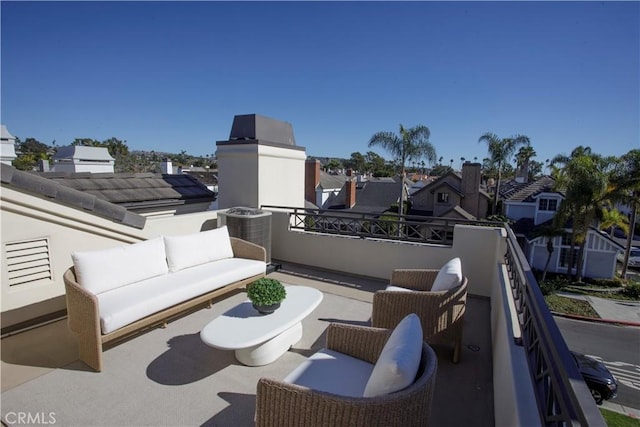 view of patio / terrace featuring a balcony and central air condition unit