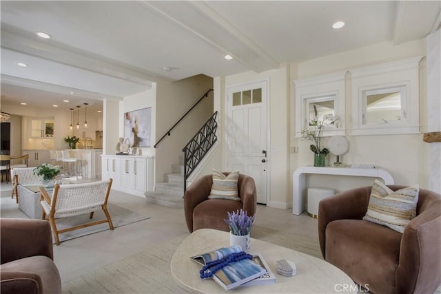 living room with beamed ceiling