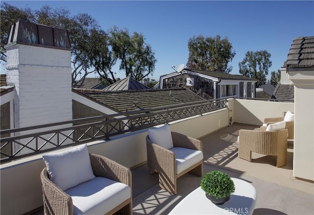 view of patio / terrace featuring a balcony