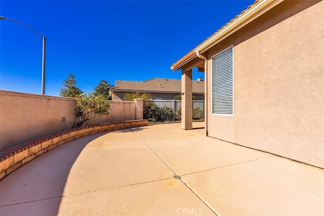 view of patio featuring a fenced backyard