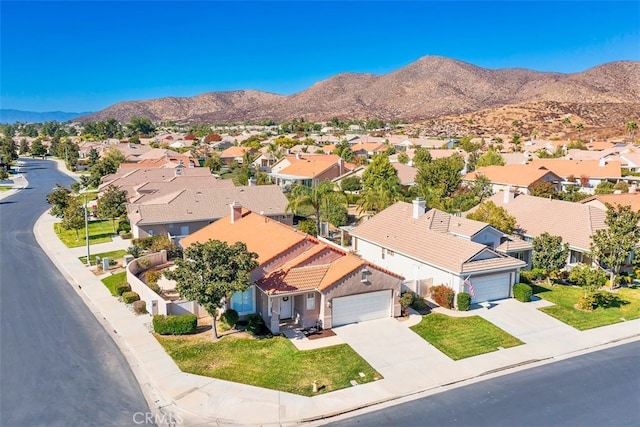 bird's eye view featuring a residential view and a mountain view