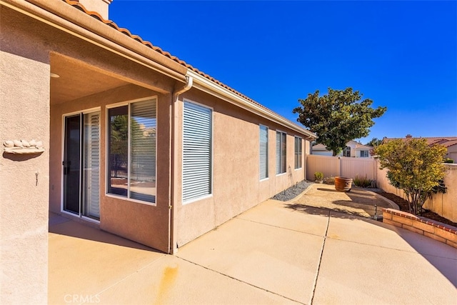 view of home's exterior featuring a patio area and stucco siding