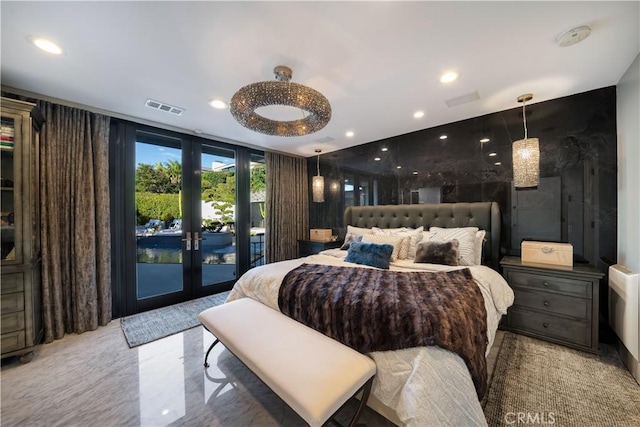 bedroom featuring access to outside, french doors, and expansive windows