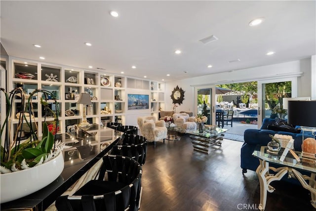 living room with dark hardwood / wood-style floors