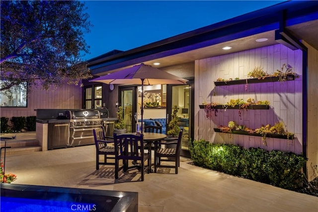 view of patio / terrace featuring grilling area and exterior kitchen