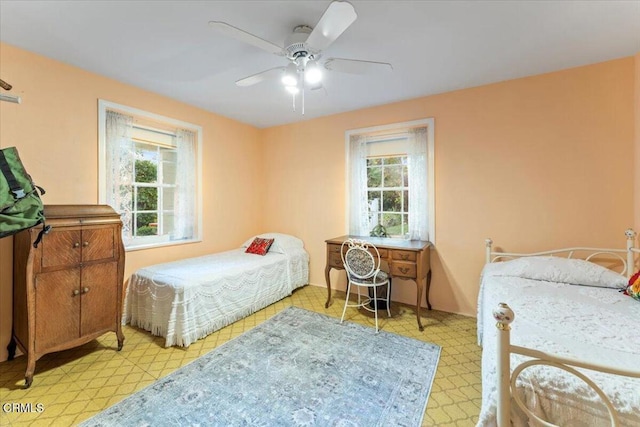 bedroom featuring ceiling fan