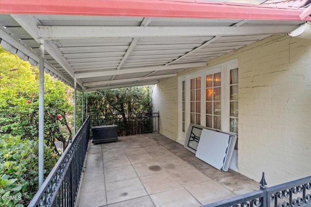 view of patio with a balcony