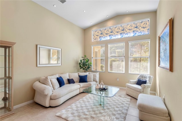 tiled living room with lofted ceiling