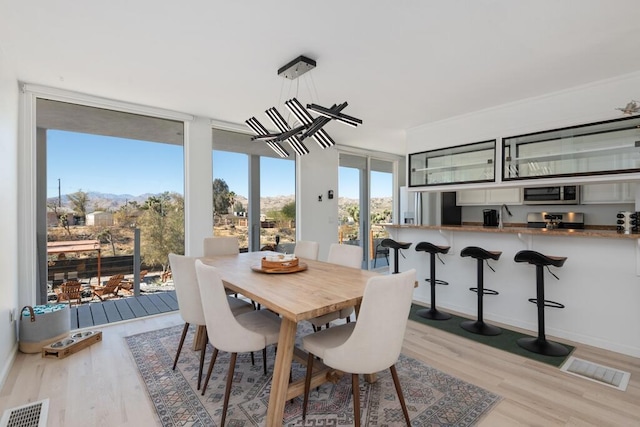 dining room featuring light wood-type flooring