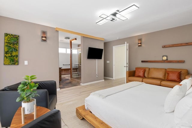 bedroom with light hardwood / wood-style flooring