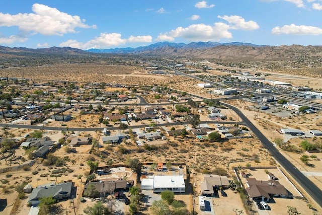 drone / aerial view featuring a mountain view