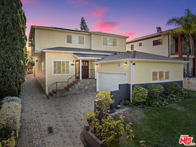 view of front of home featuring a garage