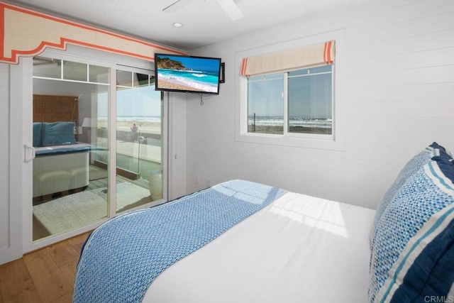 bedroom featuring recessed lighting, wood finished floors, and ceiling fan