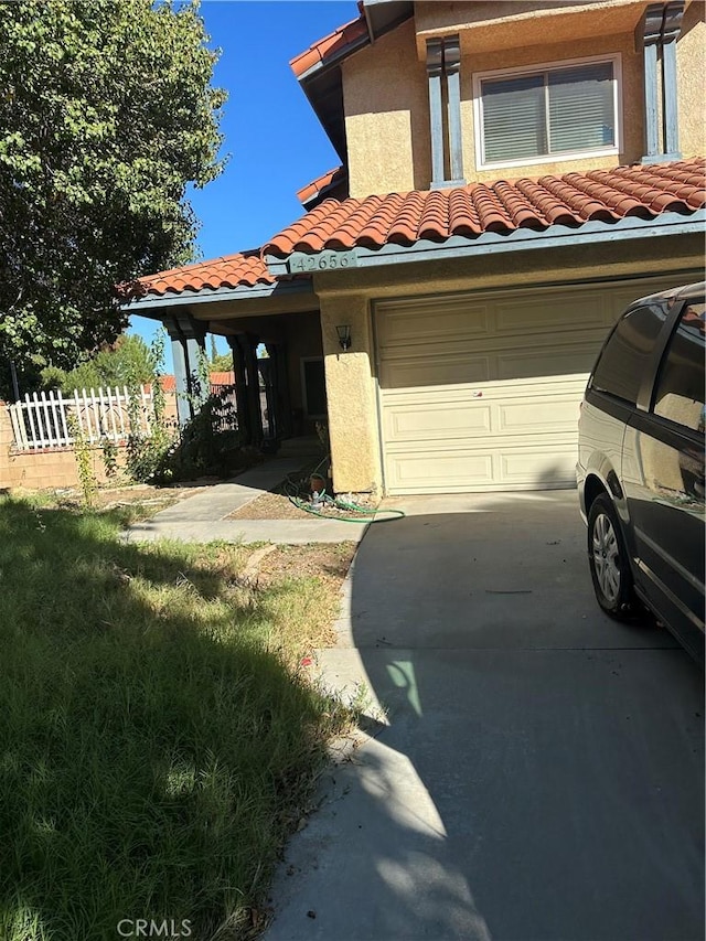 exterior space featuring a garage