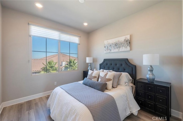 bedroom with wood-type flooring