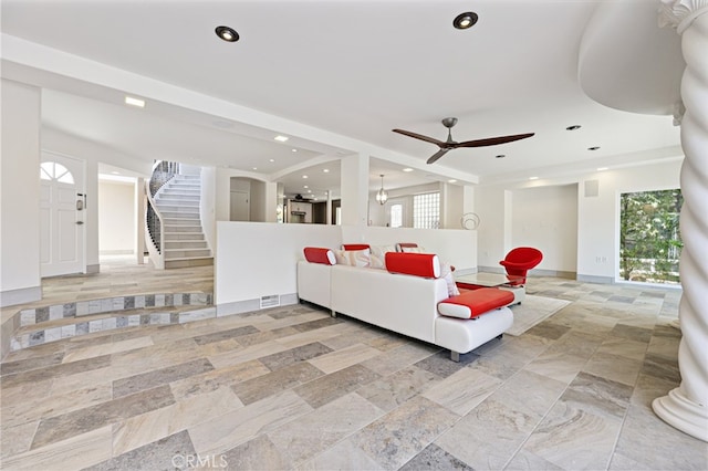 living room featuring ceiling fan