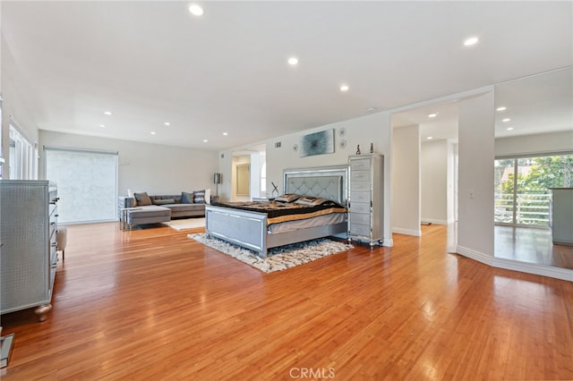 bedroom with light hardwood / wood-style flooring