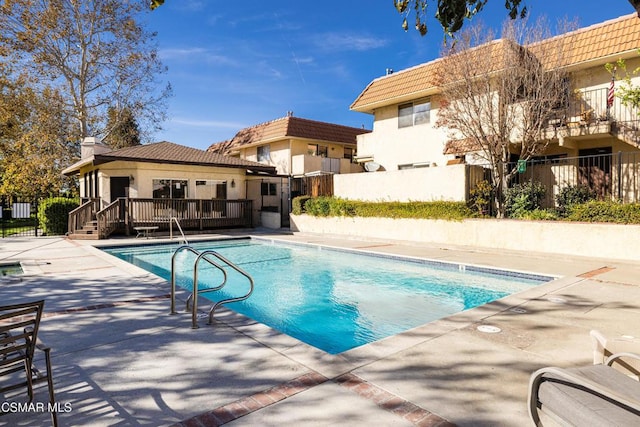 view of pool with a patio area