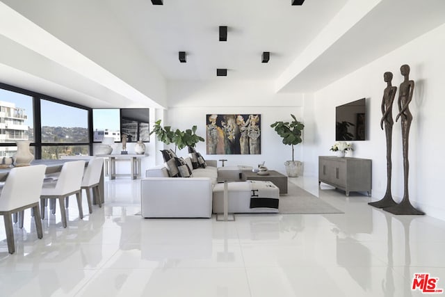 living room featuring light tile patterned flooring