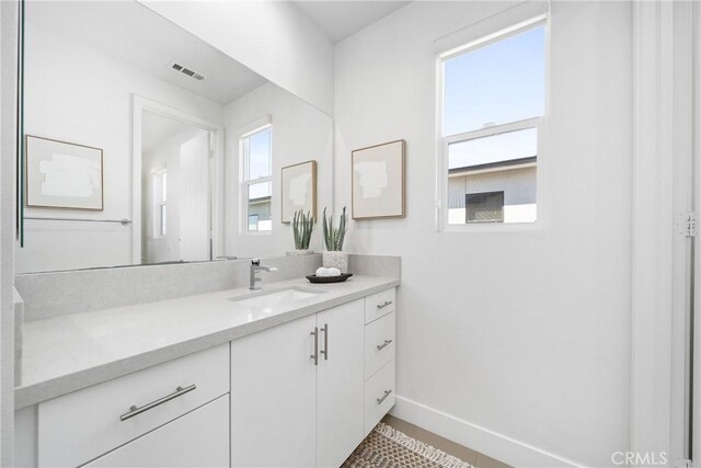 bathroom featuring vanity