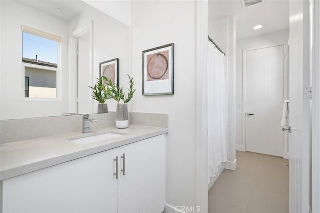 bathroom featuring vanity and tile patterned floors