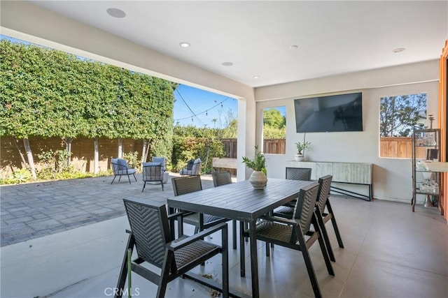 view of patio / terrace with outdoor dining area and a fenced backyard