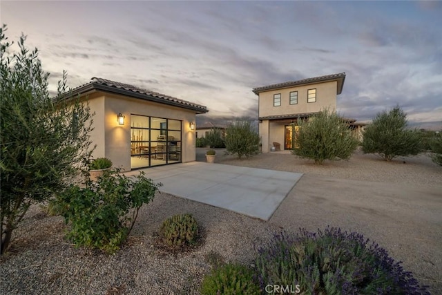 exterior space with a patio area