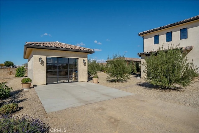 rear view of property with a patio area