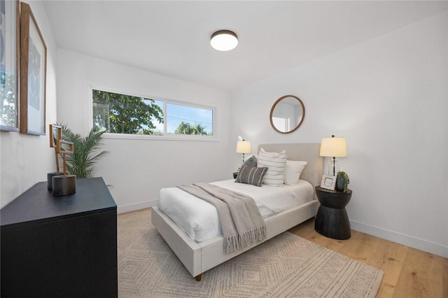 bedroom featuring wood-type flooring