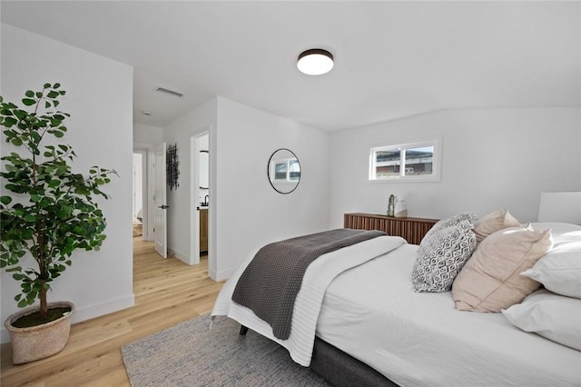 bedroom featuring light hardwood / wood-style floors