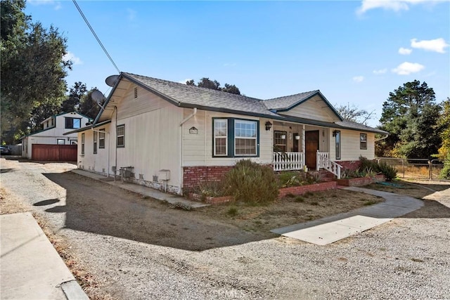 view of front of property featuring covered porch