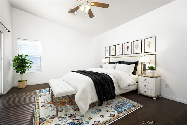 bedroom featuring ceiling fan and dark hardwood / wood-style flooring