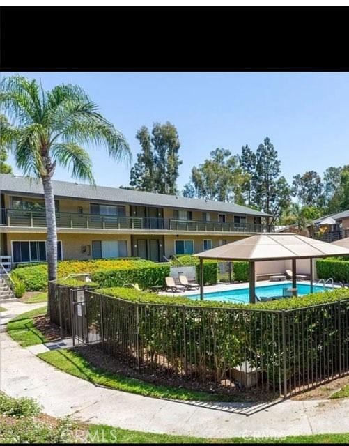 view of property's community featuring a pool