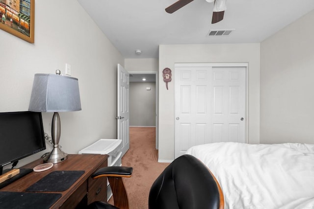 bedroom featuring ceiling fan, carpet floors, and a closet