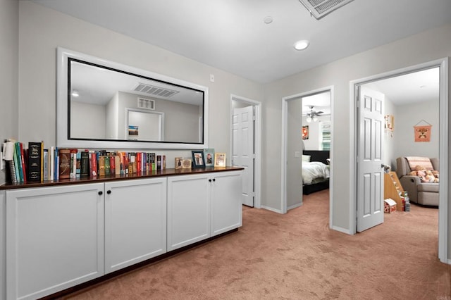 bathroom featuring ceiling fan and vanity