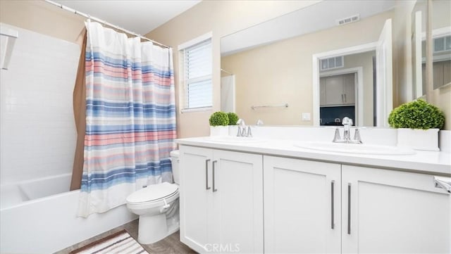 full bathroom with toilet, shower / tub combo with curtain, vanity, and hardwood / wood-style flooring