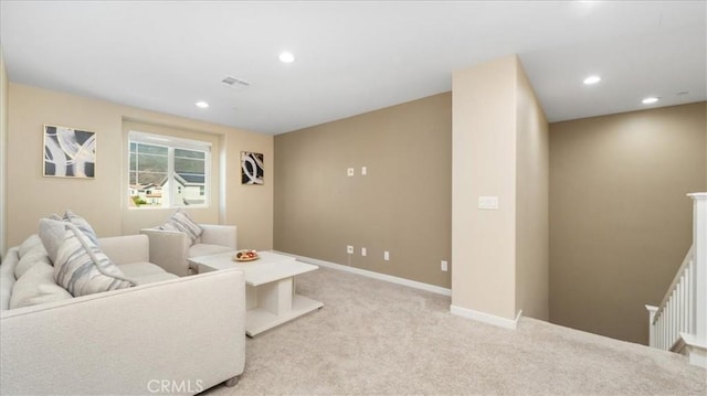 living room featuring light colored carpet