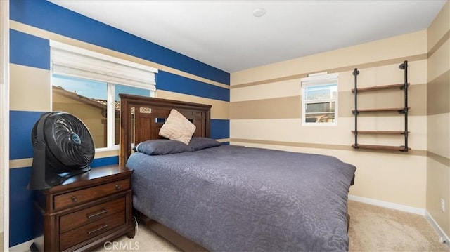 bedroom featuring light colored carpet