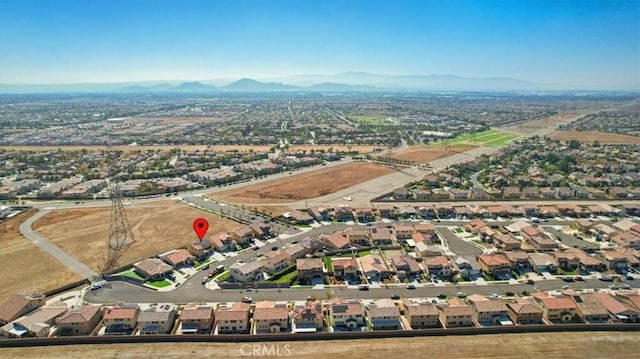 bird's eye view with a mountain view