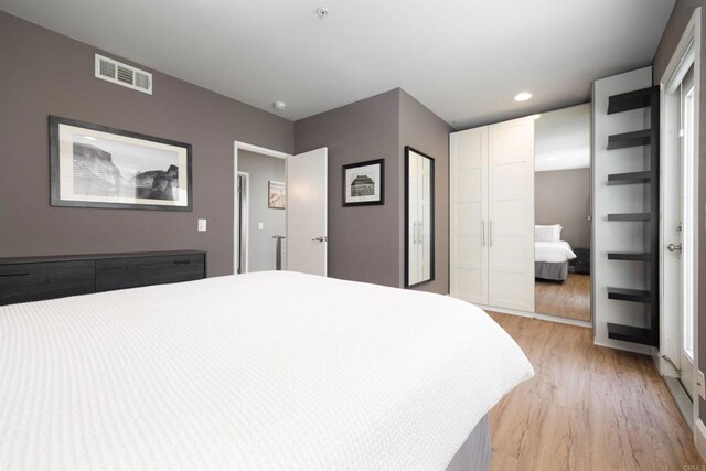 bedroom featuring light wood-type flooring