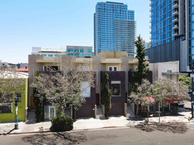 view of property with a view of city