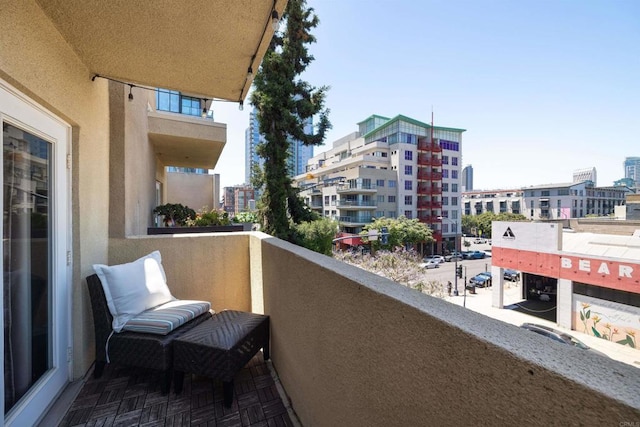 balcony featuring a view of city