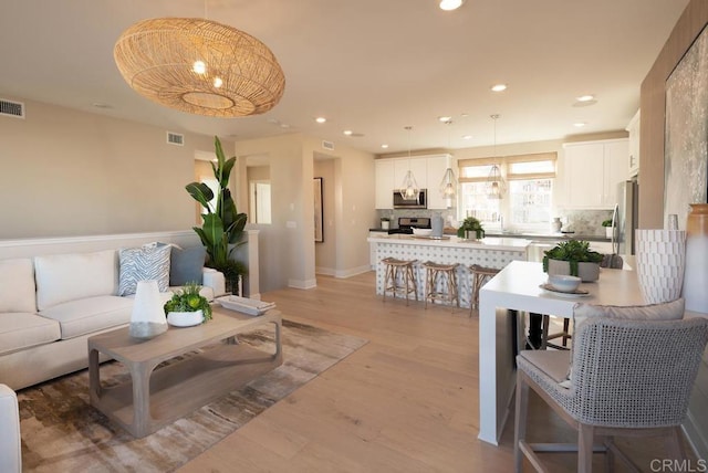 living room with light wood-type flooring