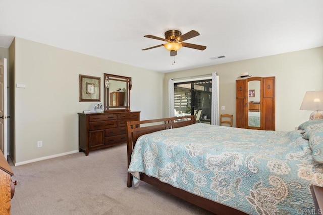 bedroom featuring access to outside, ceiling fan, and light carpet