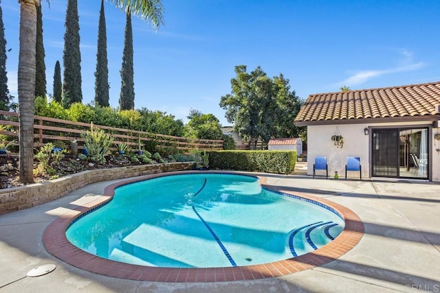 view of pool featuring a patio area