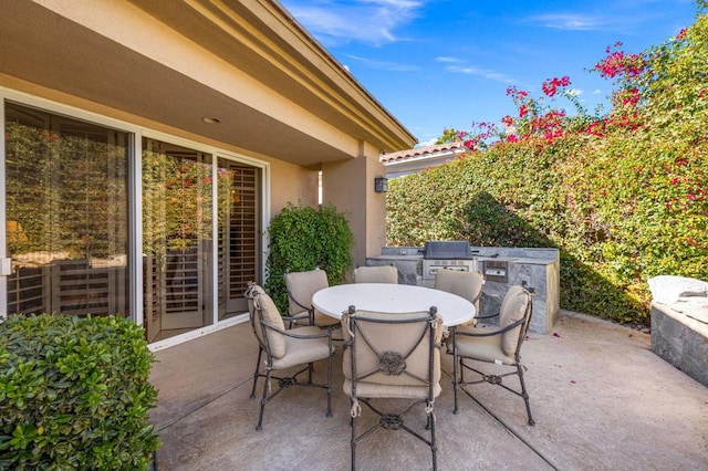 view of patio with an outdoor kitchen