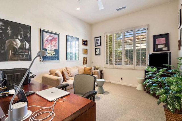 office featuring carpet and ceiling fan