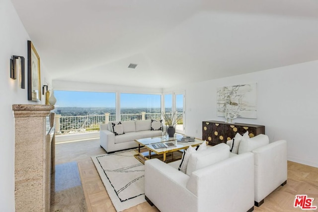 living room featuring light parquet flooring