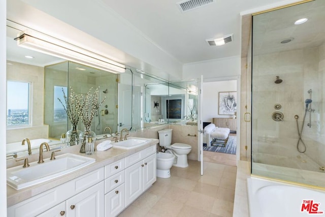 full bathroom featuring crown molding, a bidet, toilet, vanity, and independent shower and bath