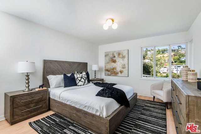 bedroom featuring light wood-type flooring